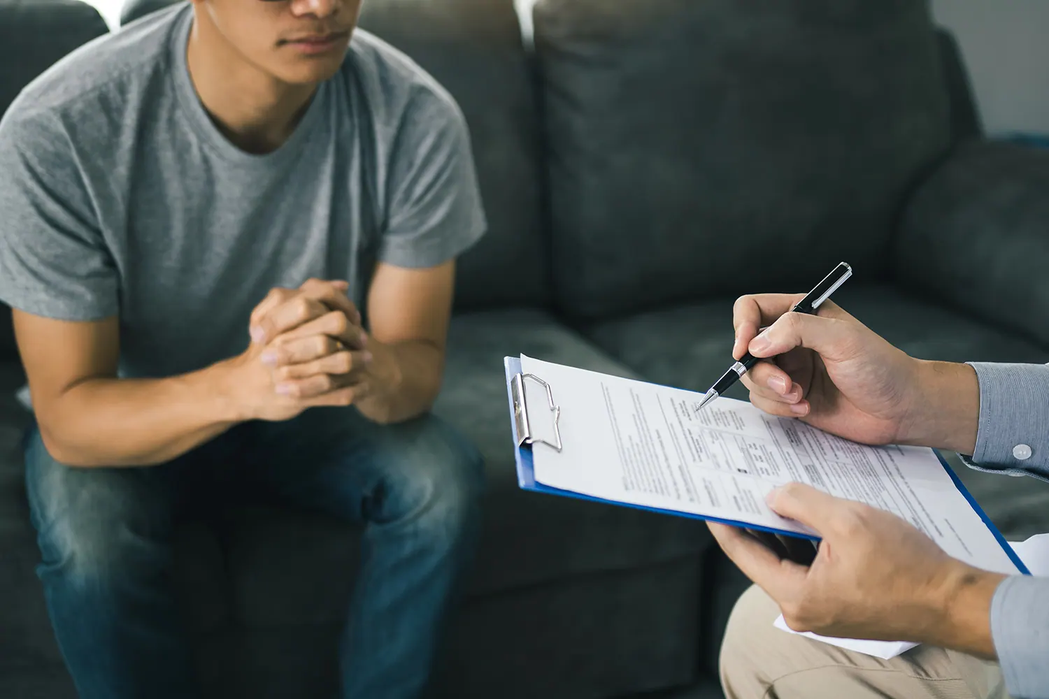 Patient filling out new patient forms